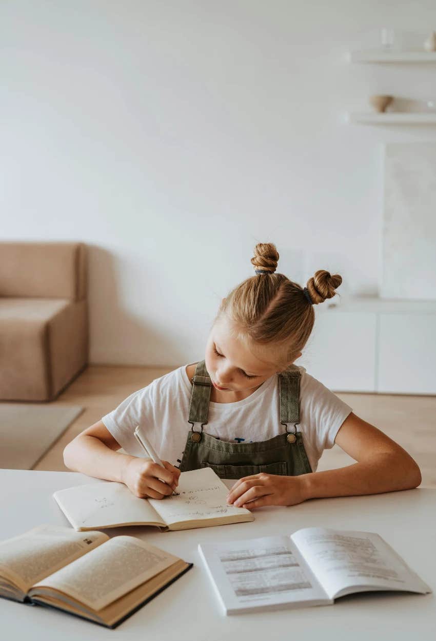 gifted child about to graduate from college studying 