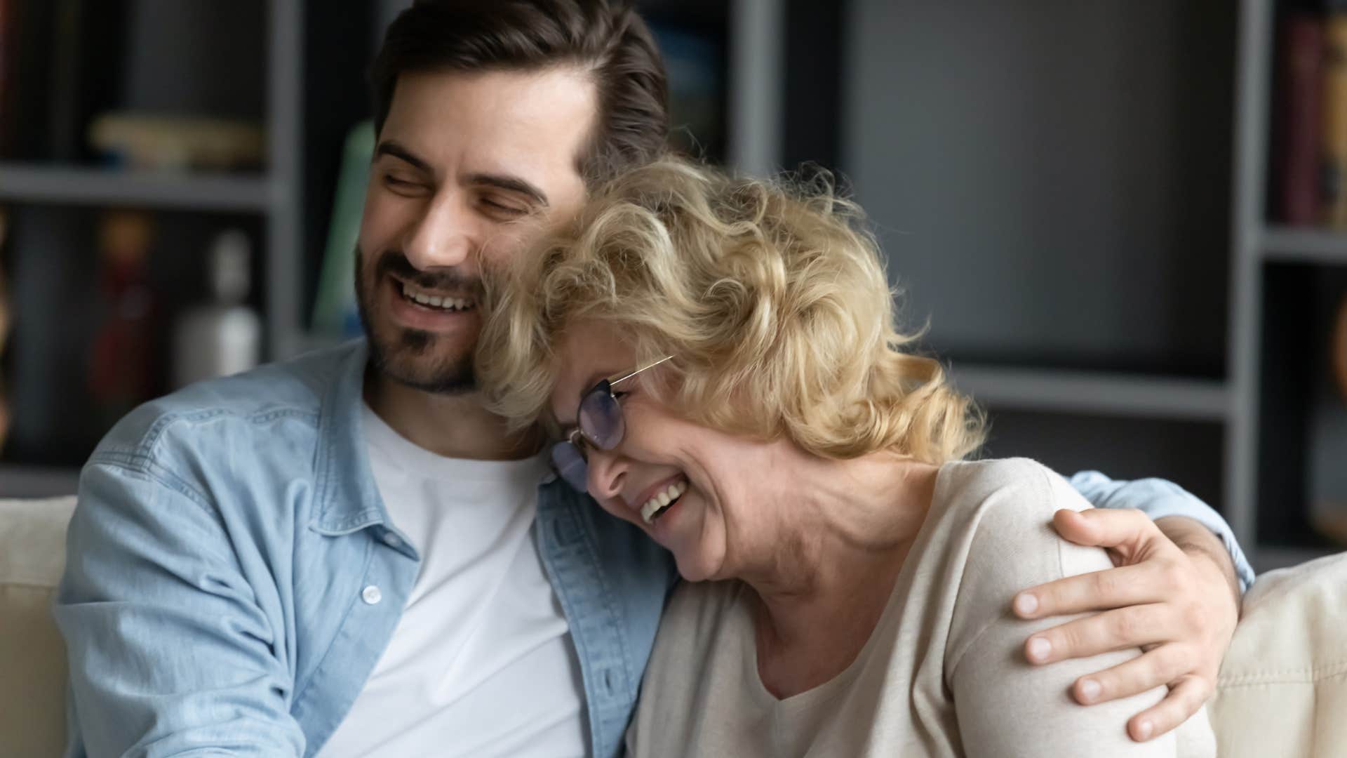 Man hugging his warm and affectionate mother.