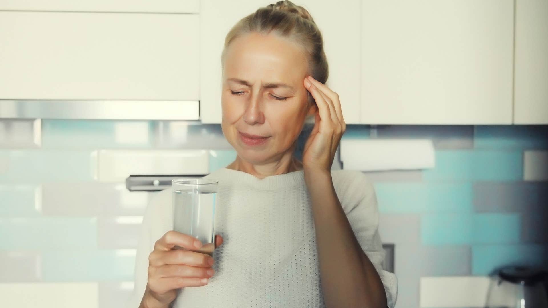 dehydrated tired woman not drinking enough water