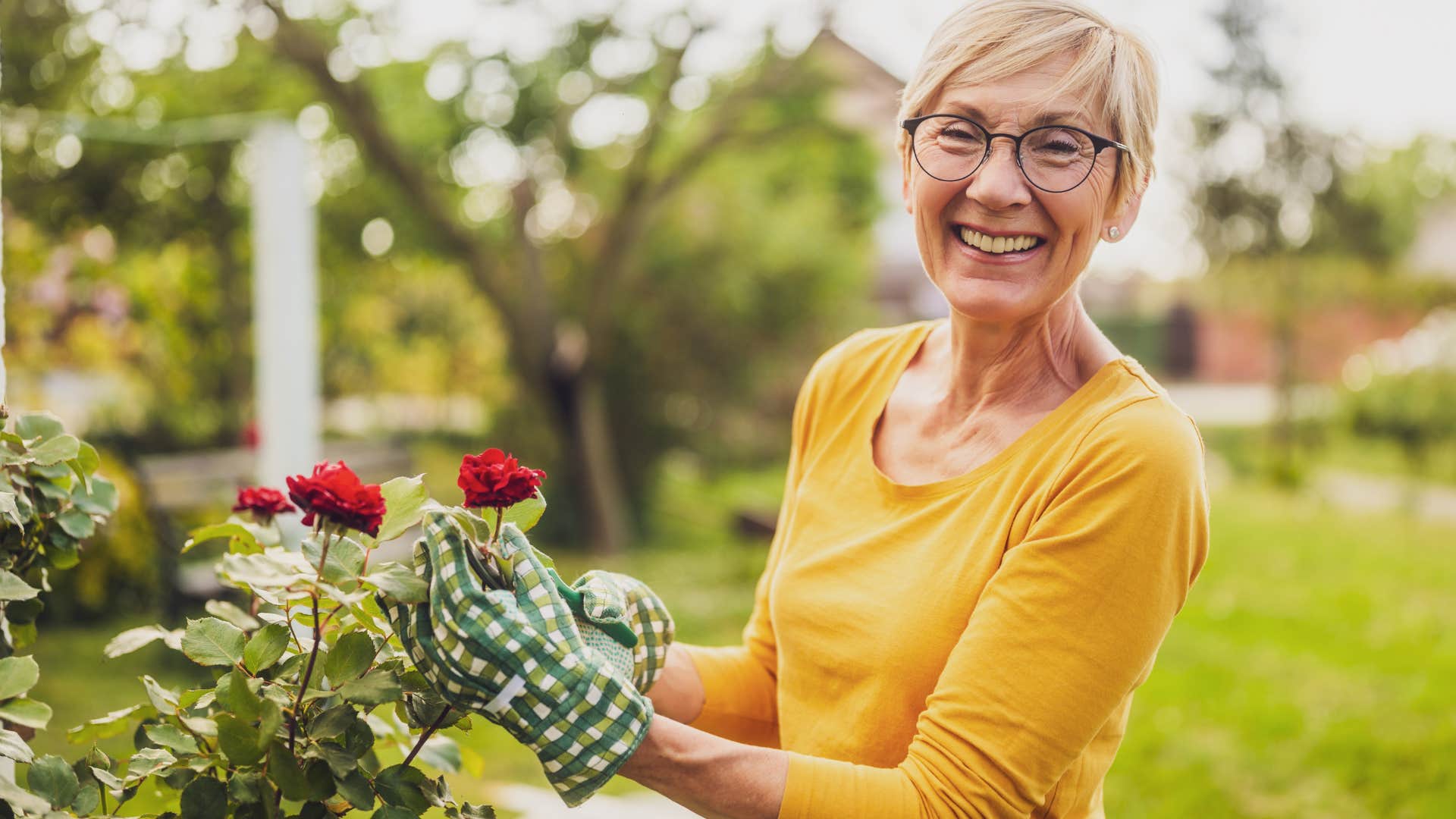 Woman who chooses solitude over social life gardening outside