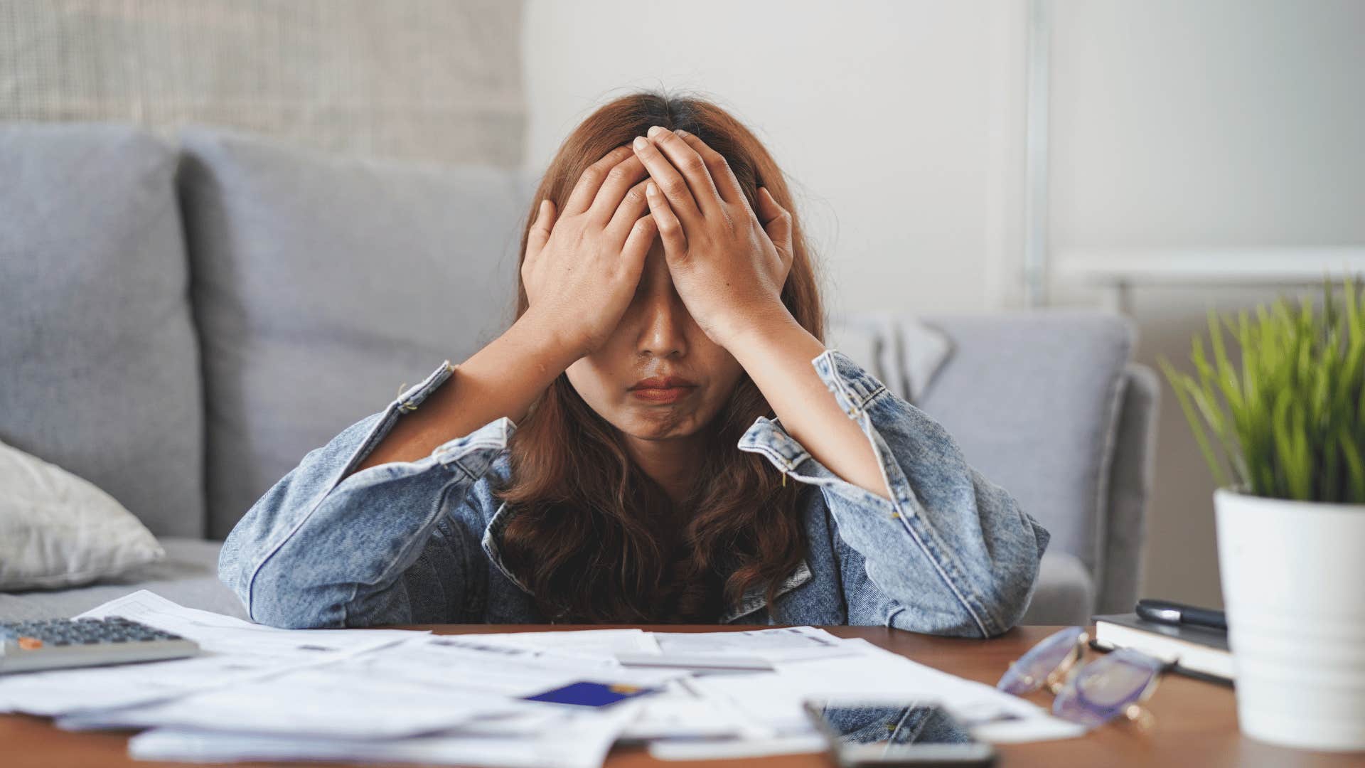 woman stressed she has no money to go out