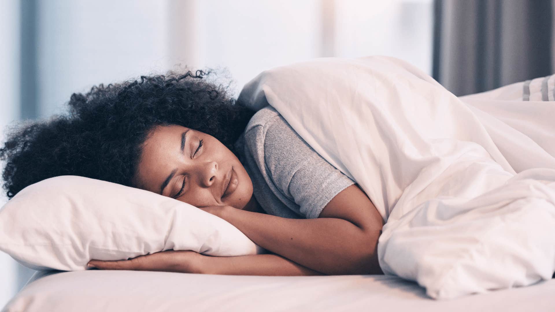 woman sleeping in on the weekend
