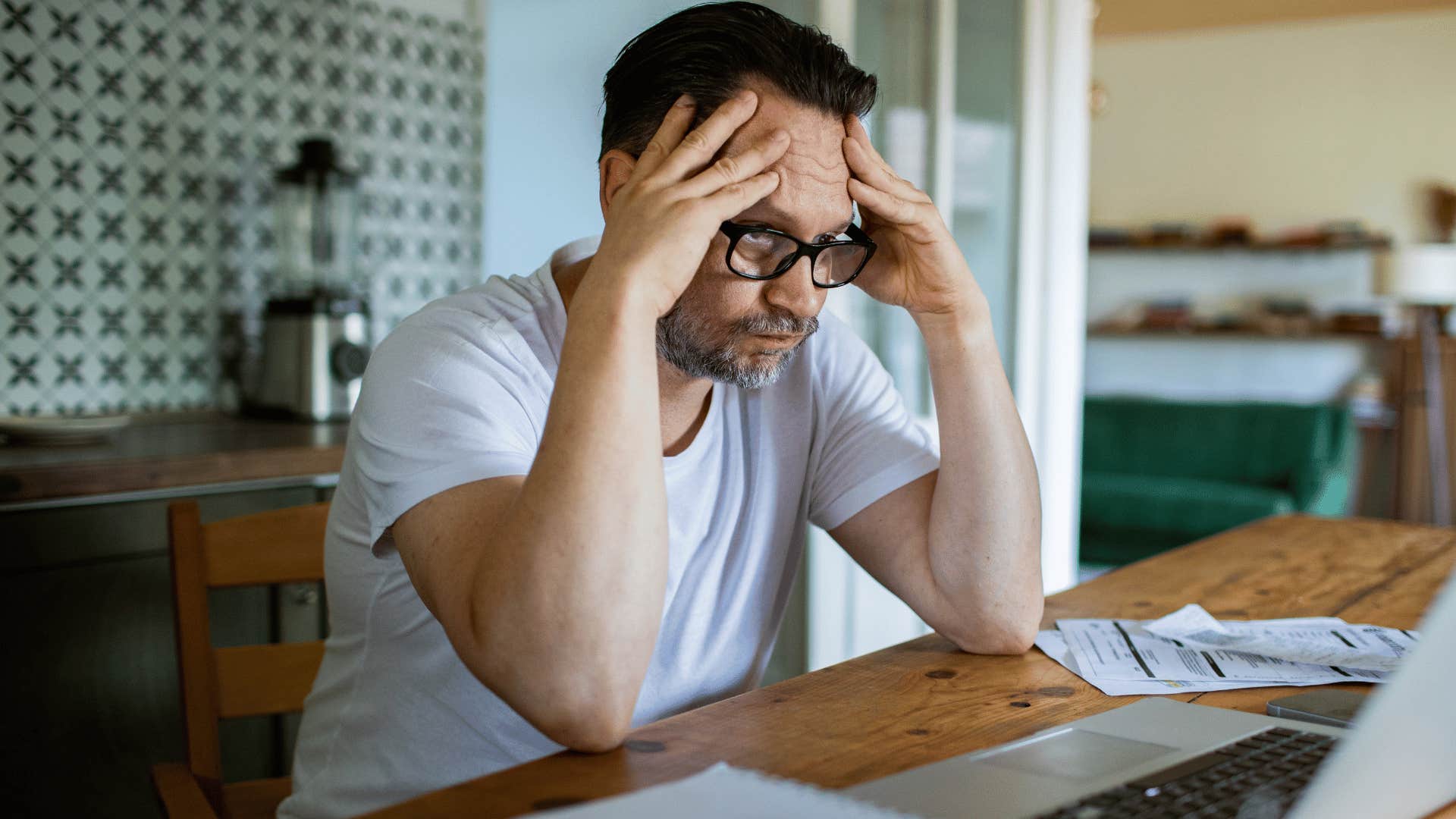 stressed man feeling disconnected from himself