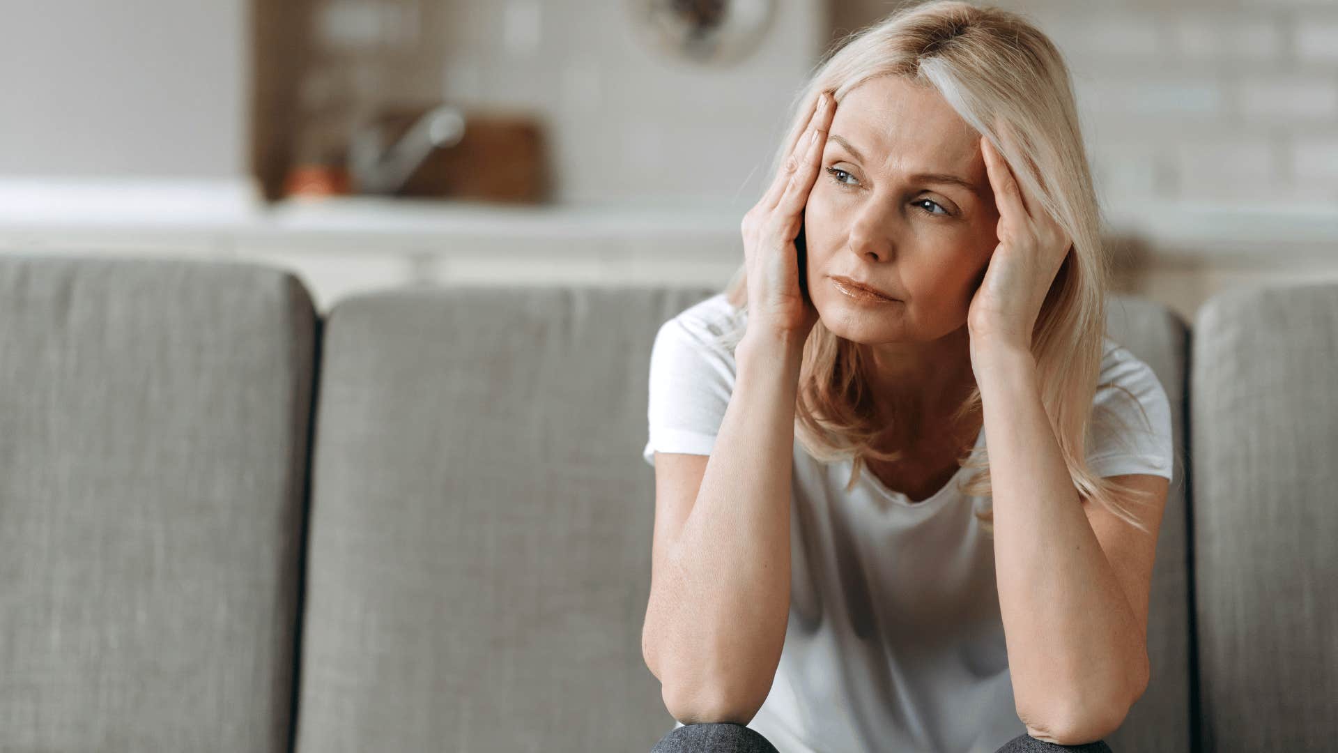 woman with poor coping mechanisms looking stressed