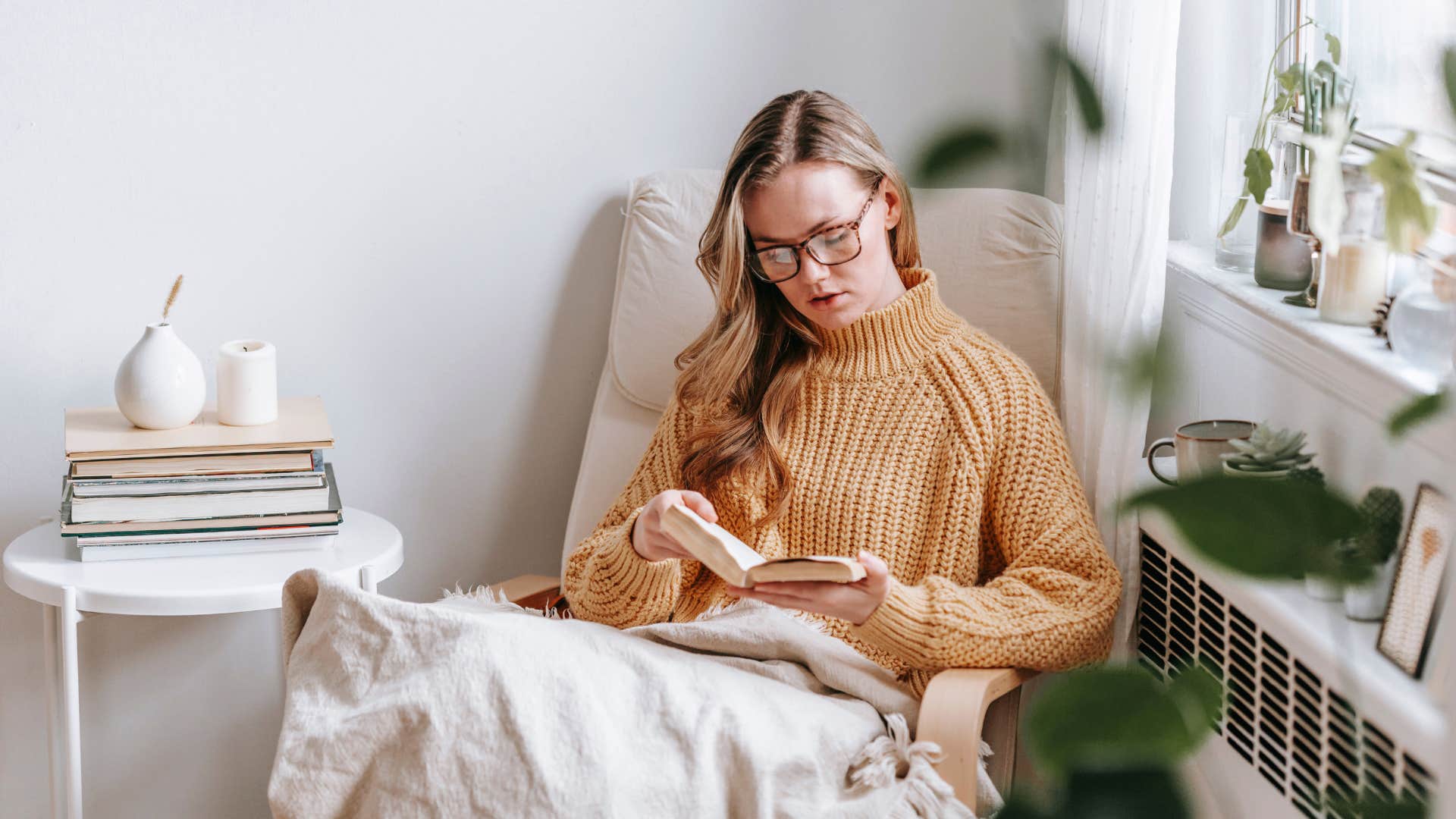 woman who hates going out with a reading nook in her home