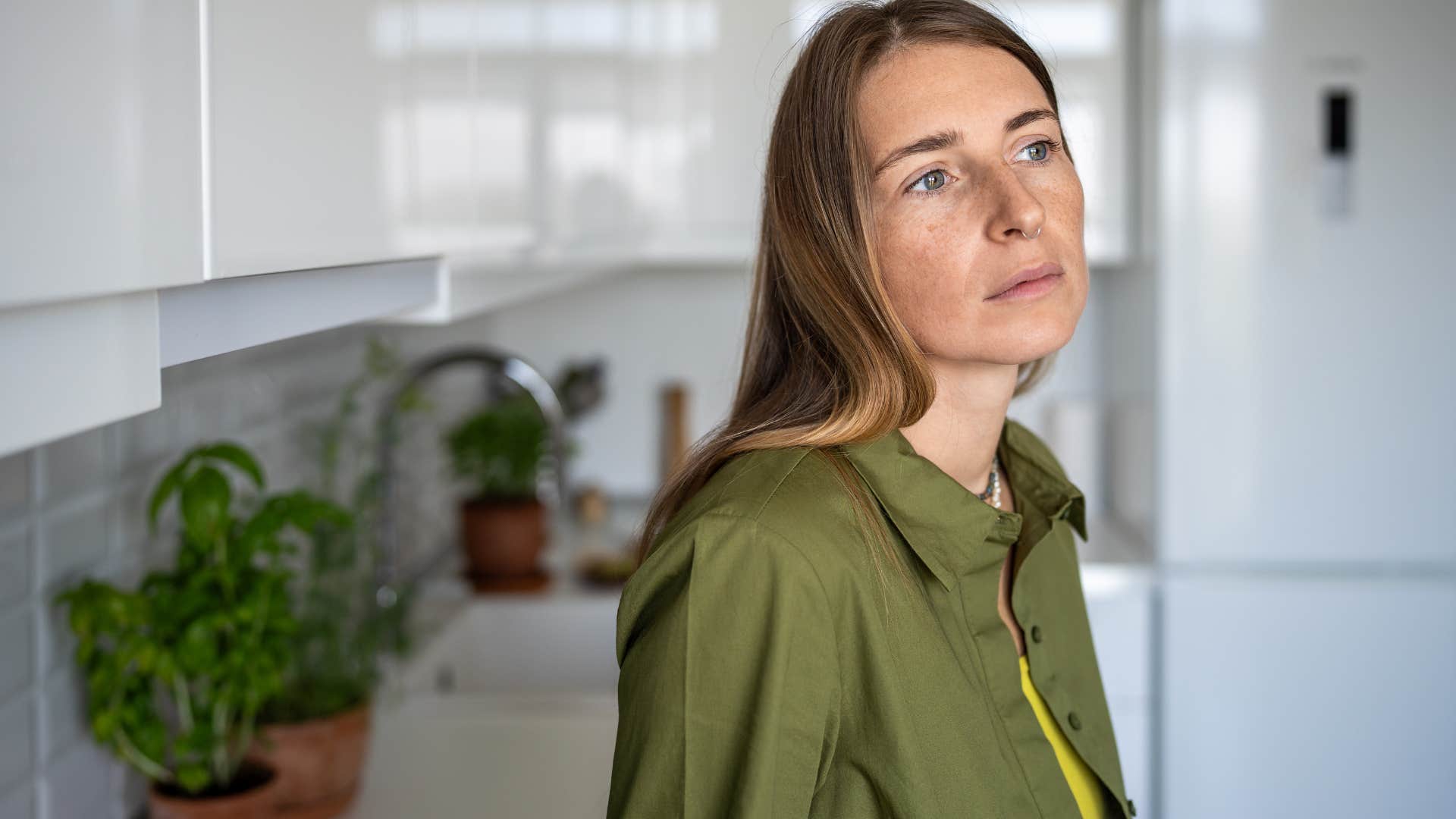 sad woman with low self-esteem staring