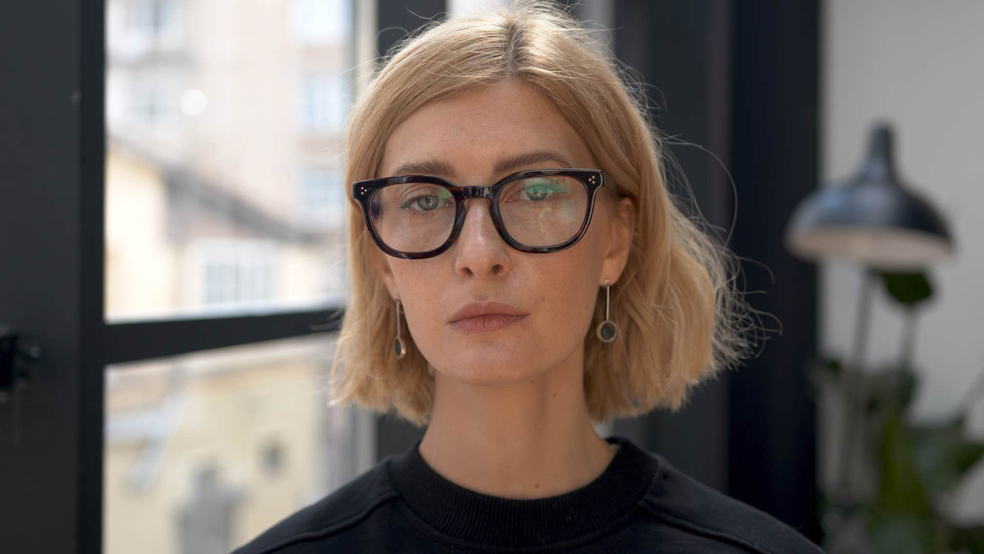 woman who stopped caring about fitting in as she's gotten older because she views conformity as a detriment to personal well-being