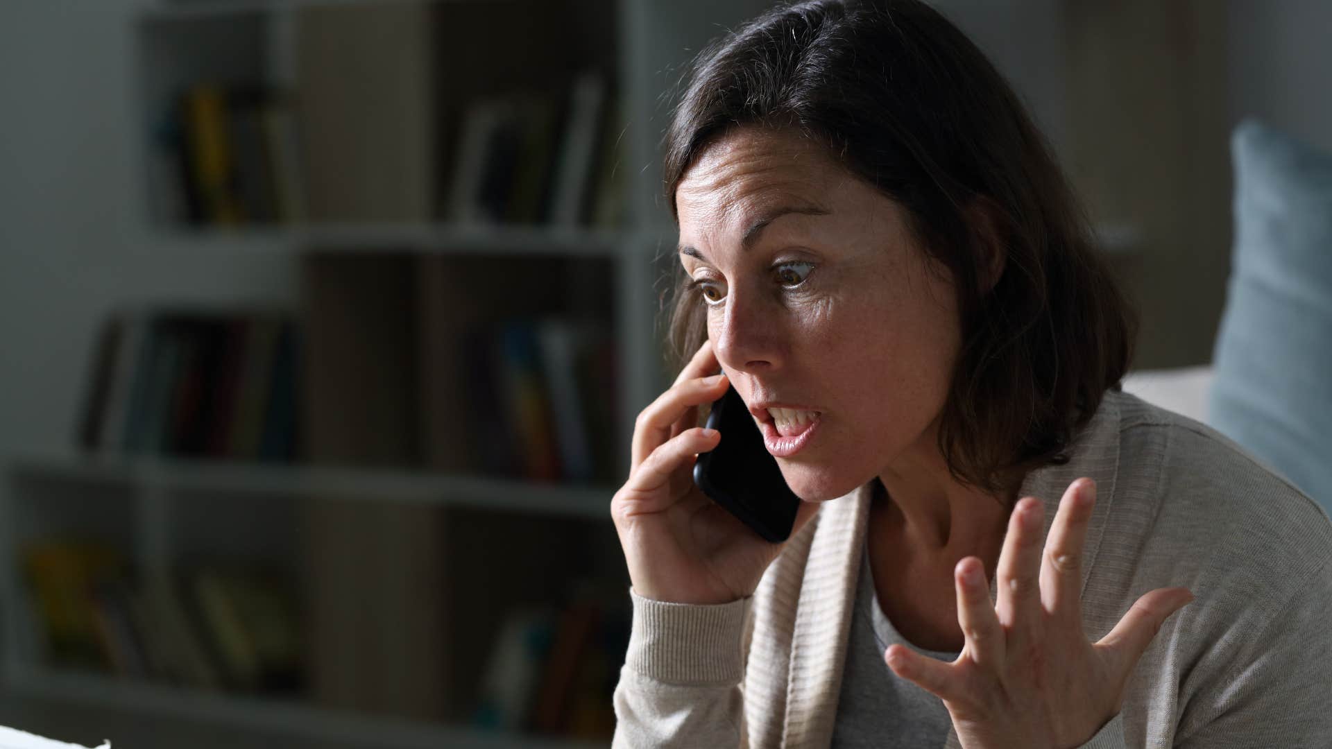 burnt out woman arguing on the phone