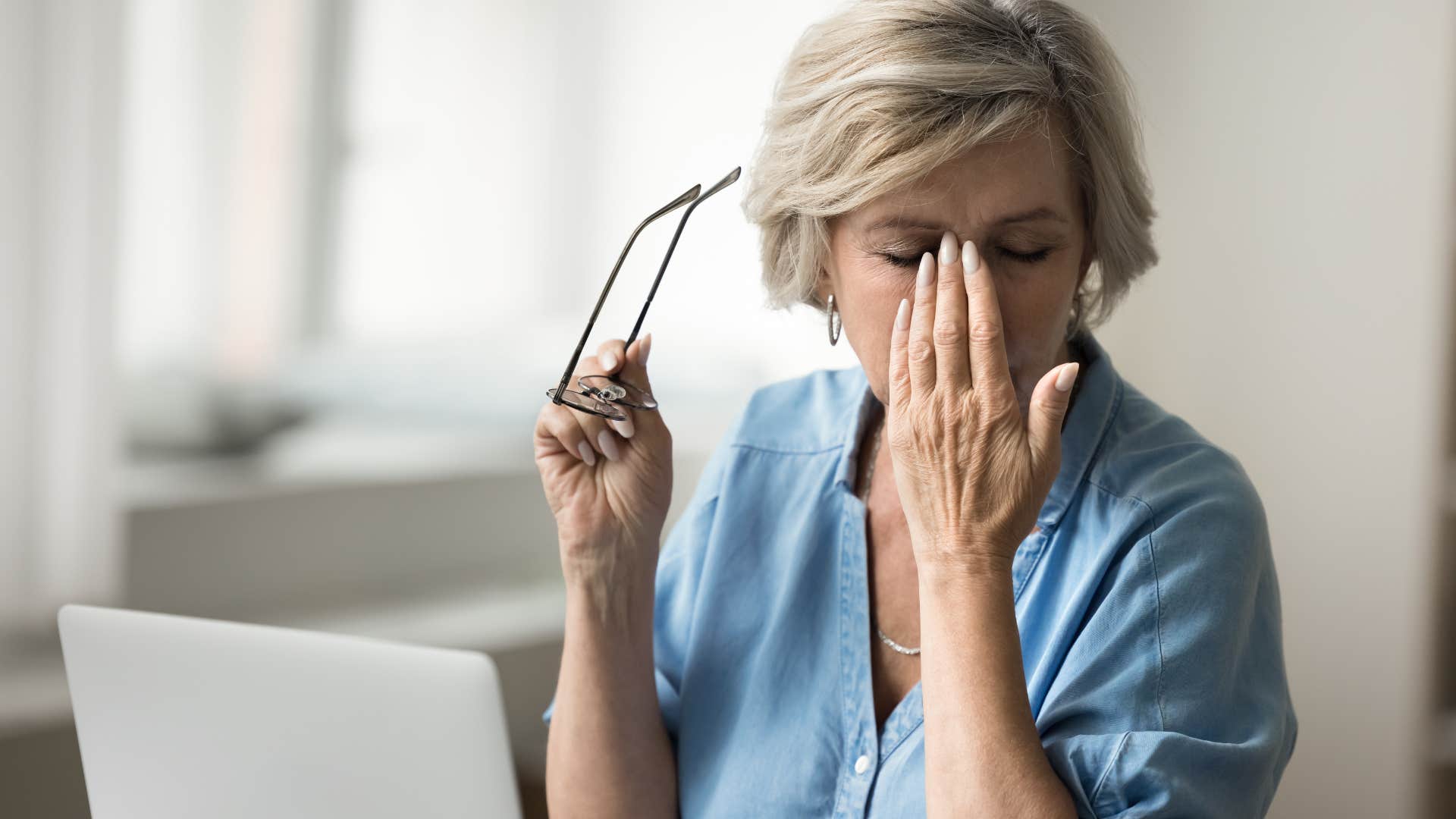 woman who struggles with health conditions looking stressed