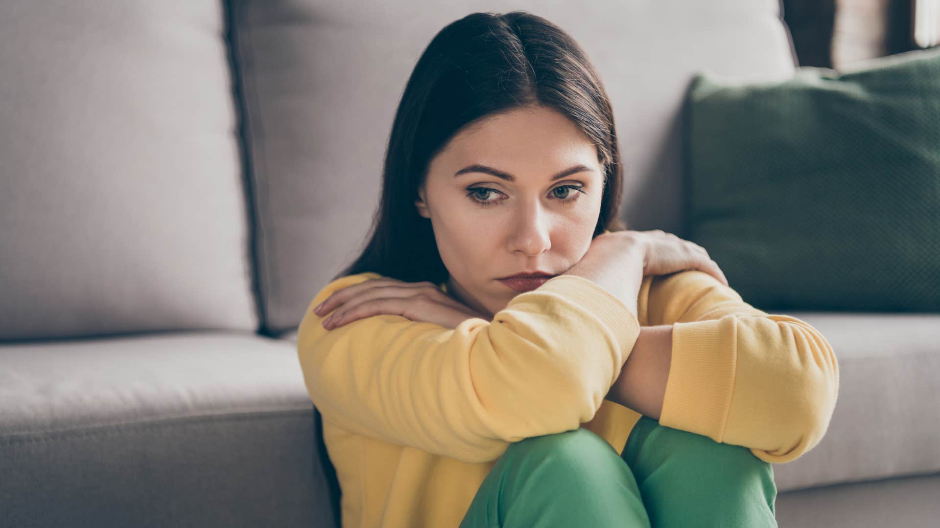 sad young woman feeling guilty for refusing to do something for someone