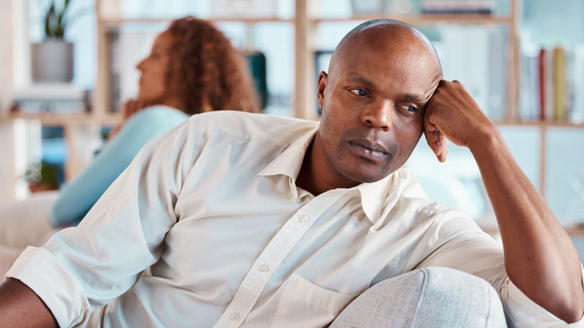 man with a fear of conflict avoiding woman