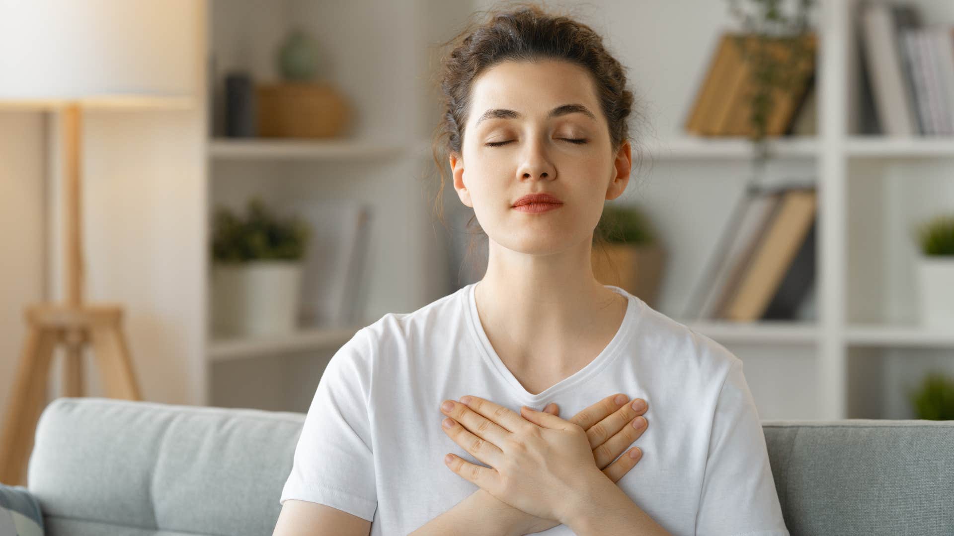 young woman reclaiming her boundaries and meditating