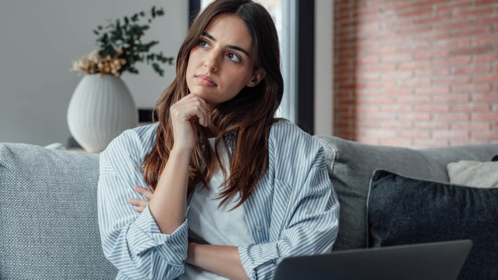 thinking woman feeling guilty for wanting more out of life