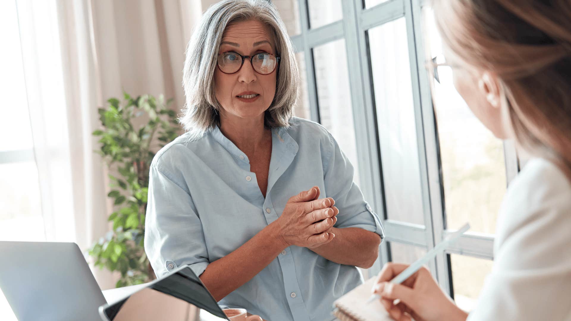 Professional woman telling co-worker you’re being disrespectful