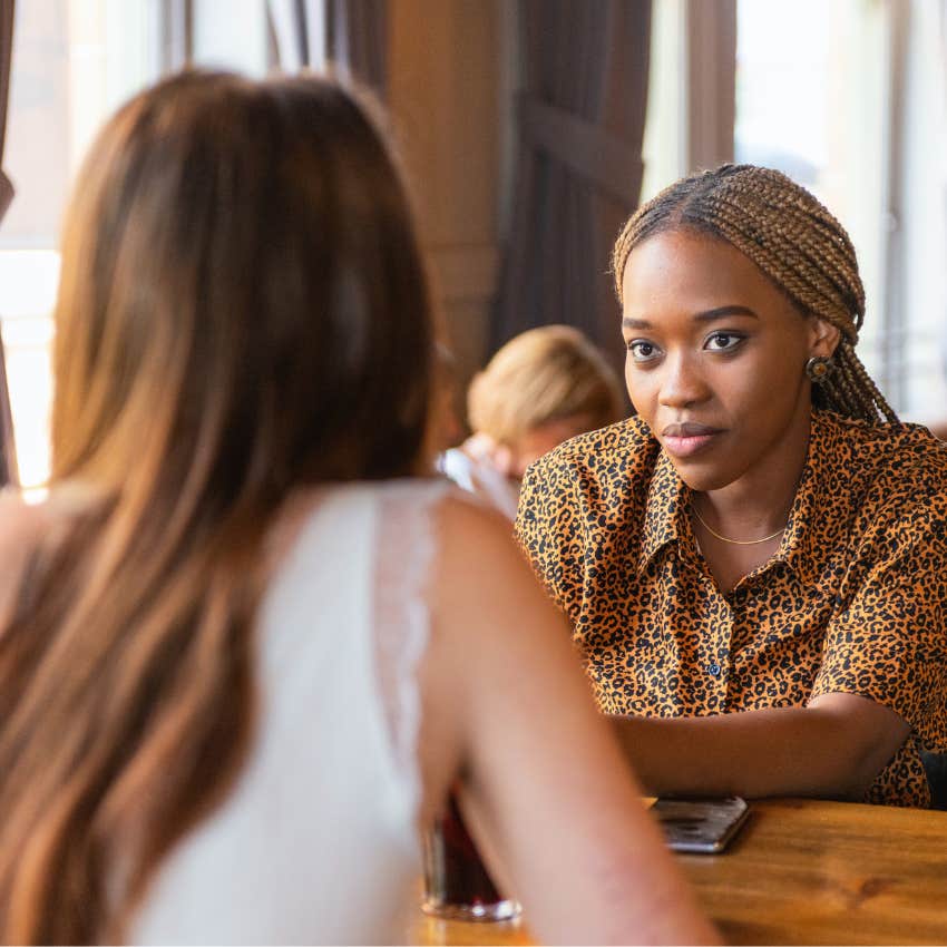 woman telling someone she's all ears to avoid small talk