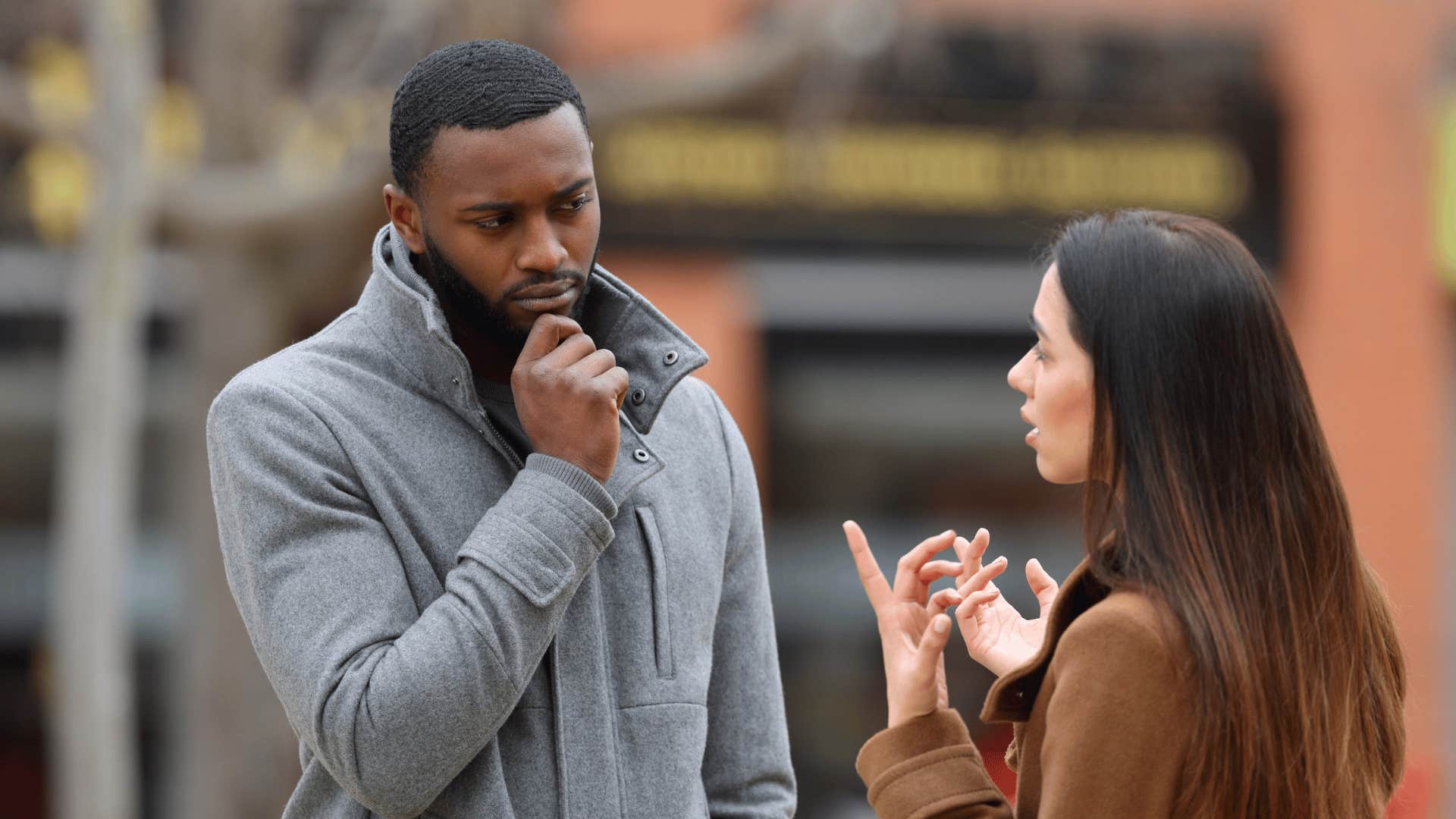 man trying to offer sympathy to woman