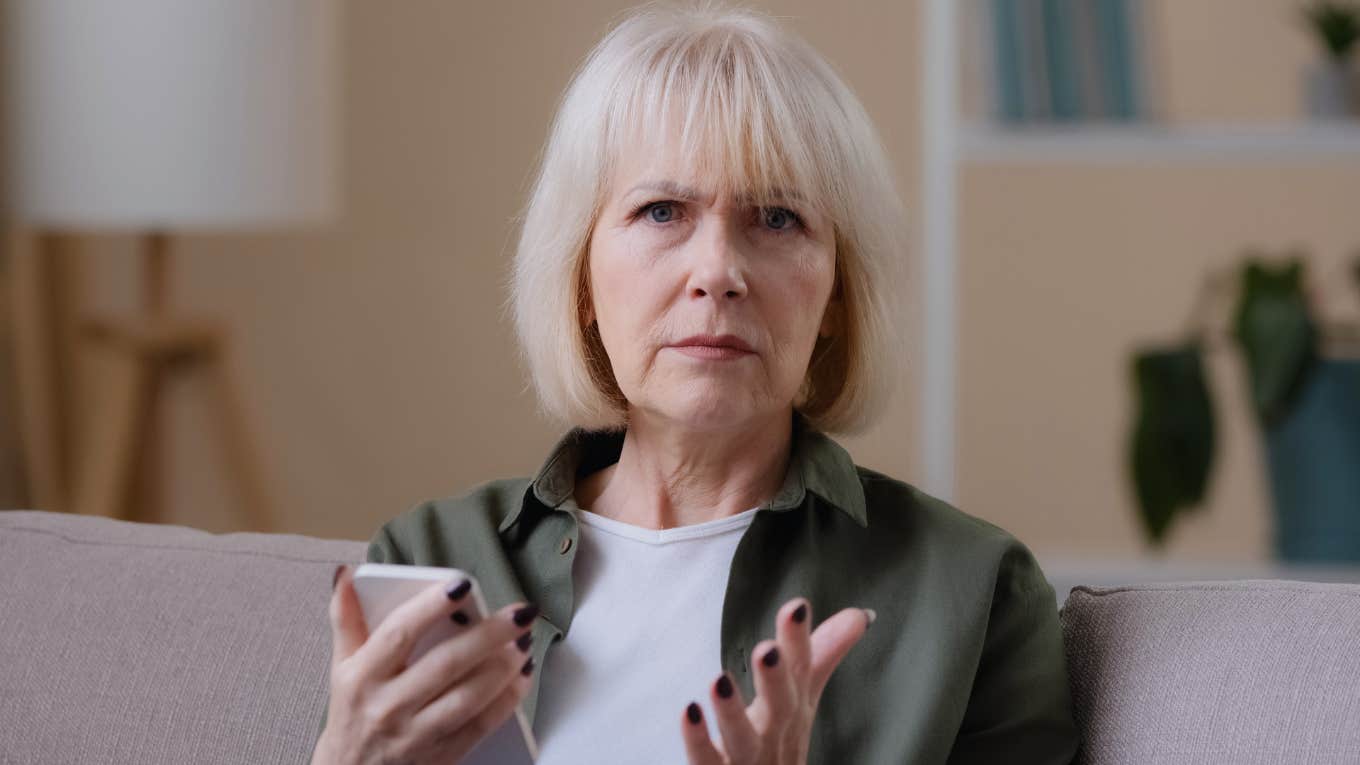 annoyed older woman trying to be polite