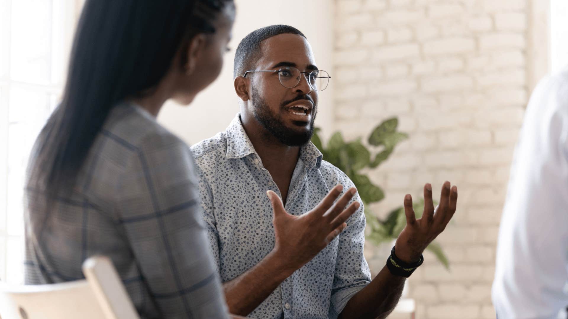 frustrated worker speaking up to colleagues