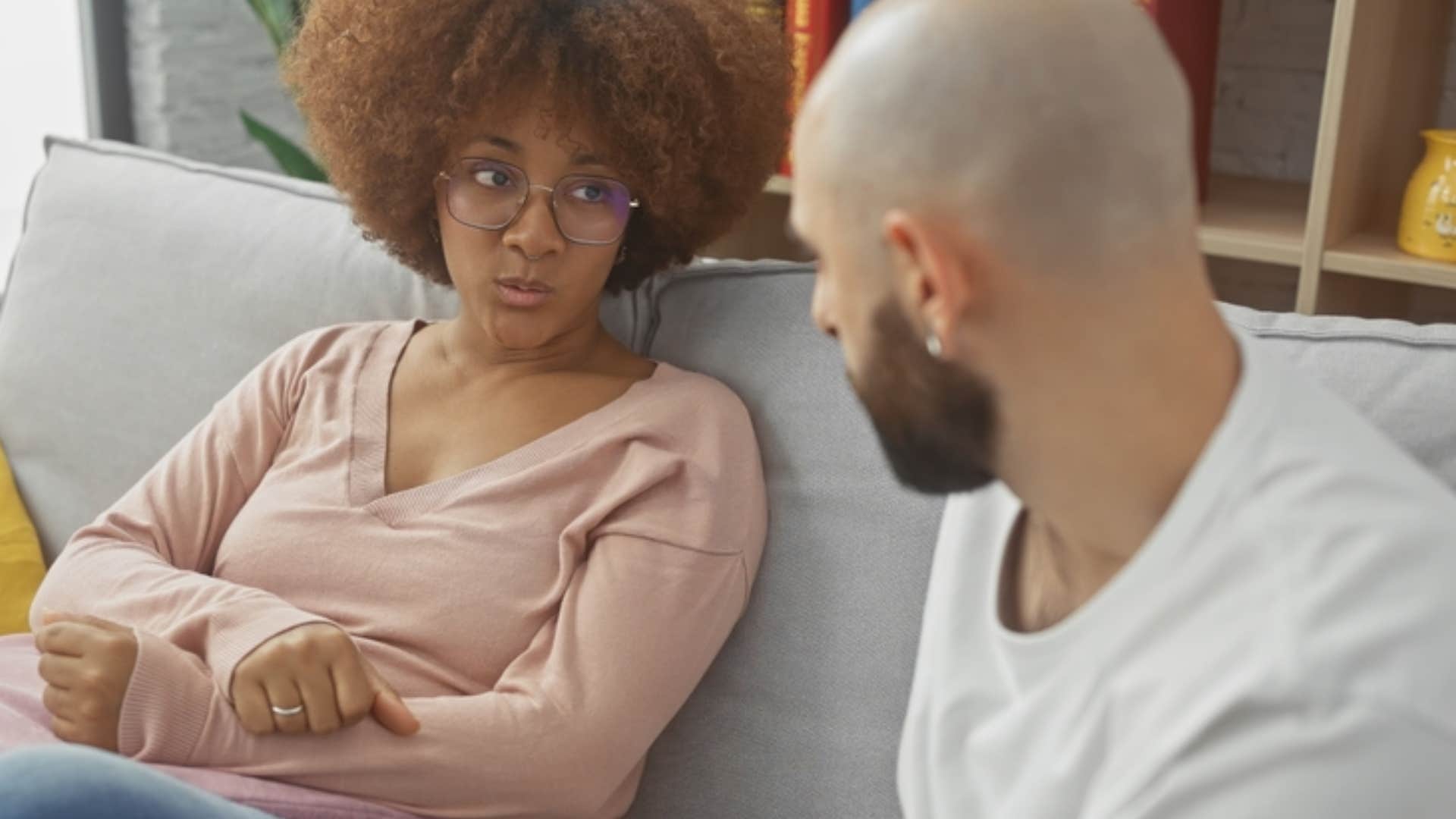 woman talking to man looking frustrated