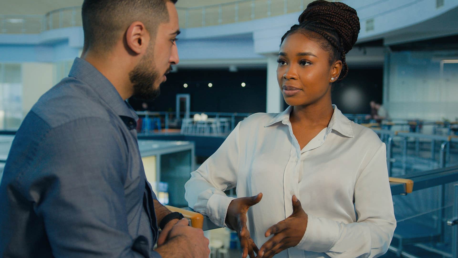 woman speaking to colleague saying she wants this to work