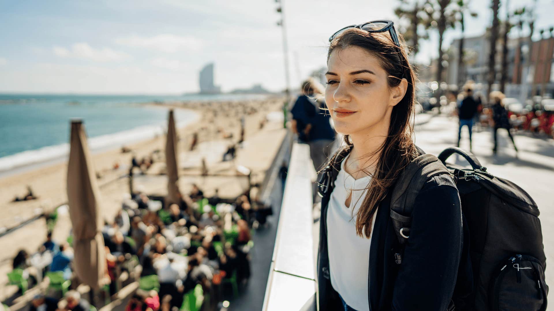 woman standing near a beach knowing the right ones won’t run away
