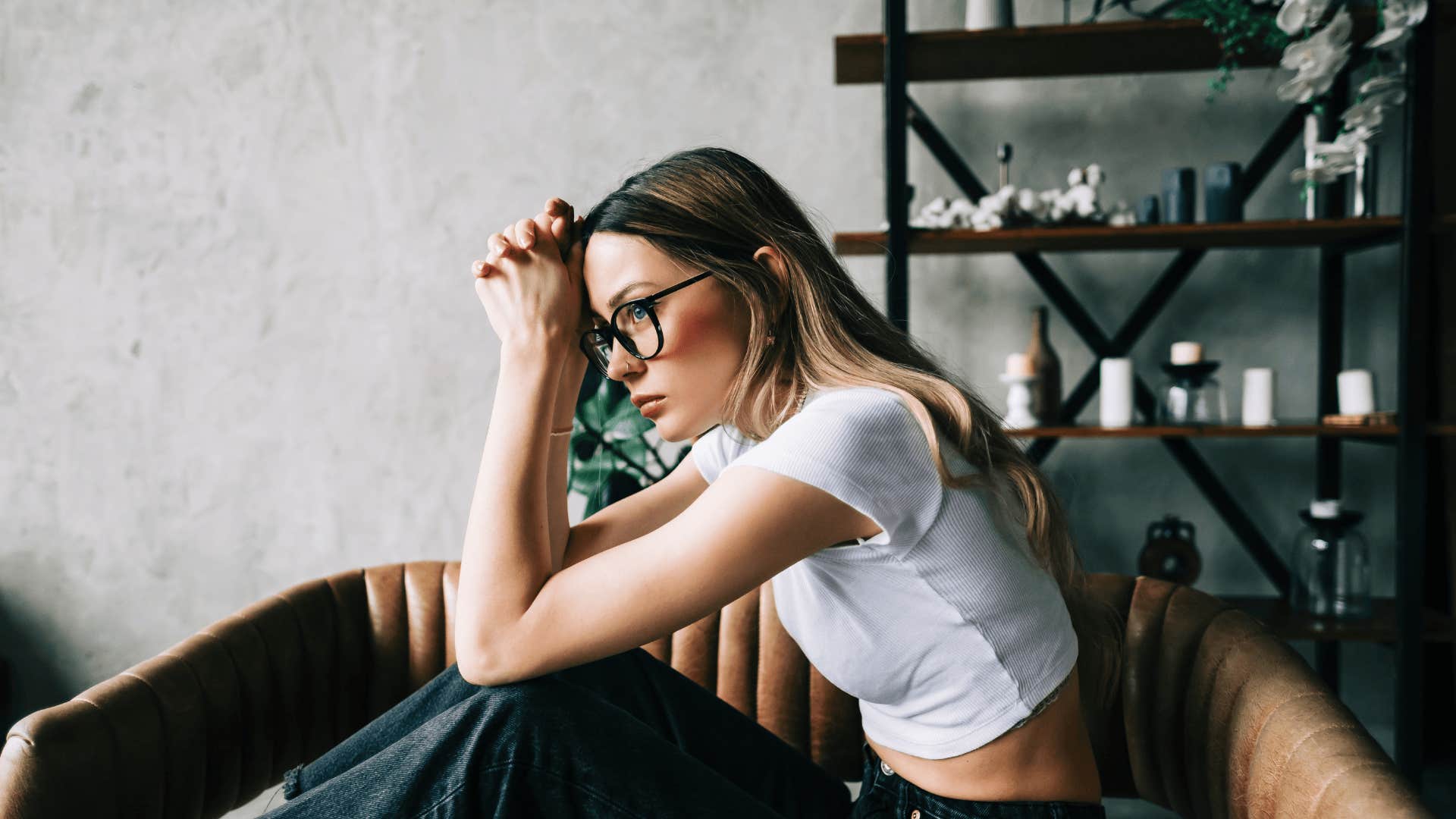woman sitting on couch won’t abandon herself for anyone else