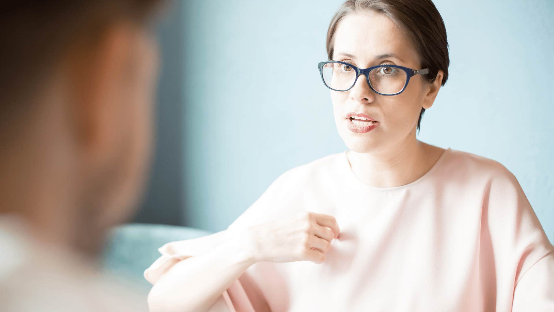woman speaking to arrogant man about power