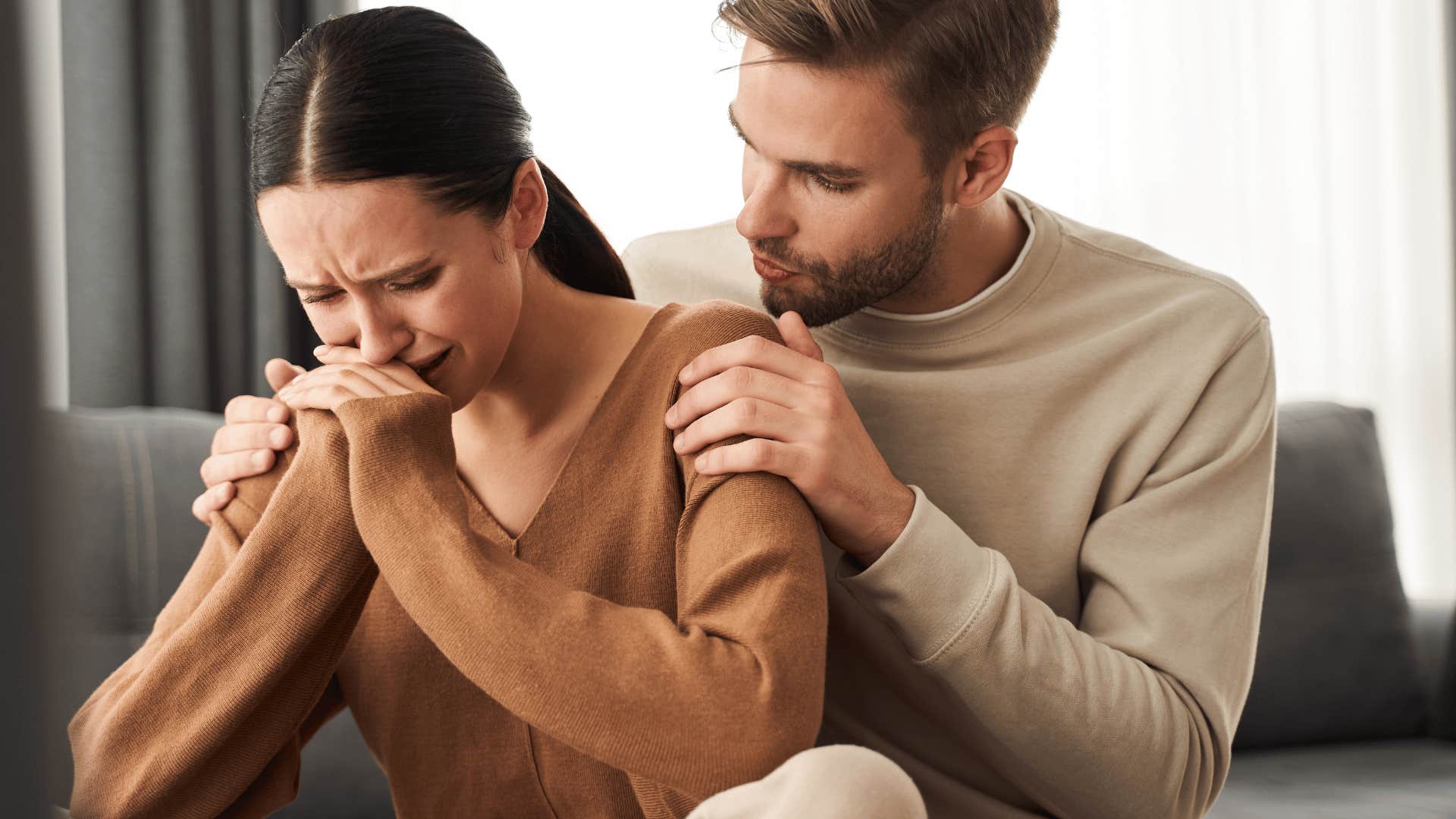 A husband tries to comfort his wife to see why she is focusing on a certain issue.