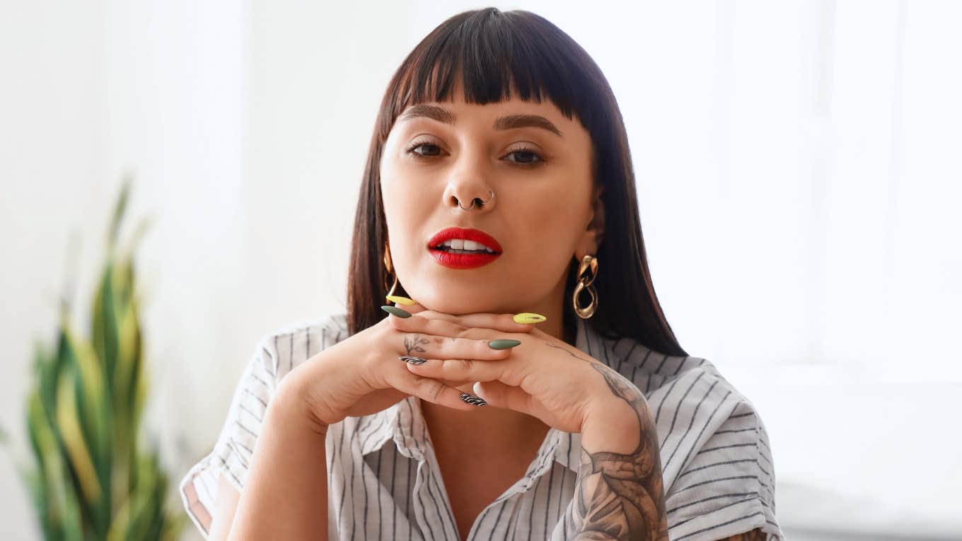 socially awkward woman in conversation appearing fake