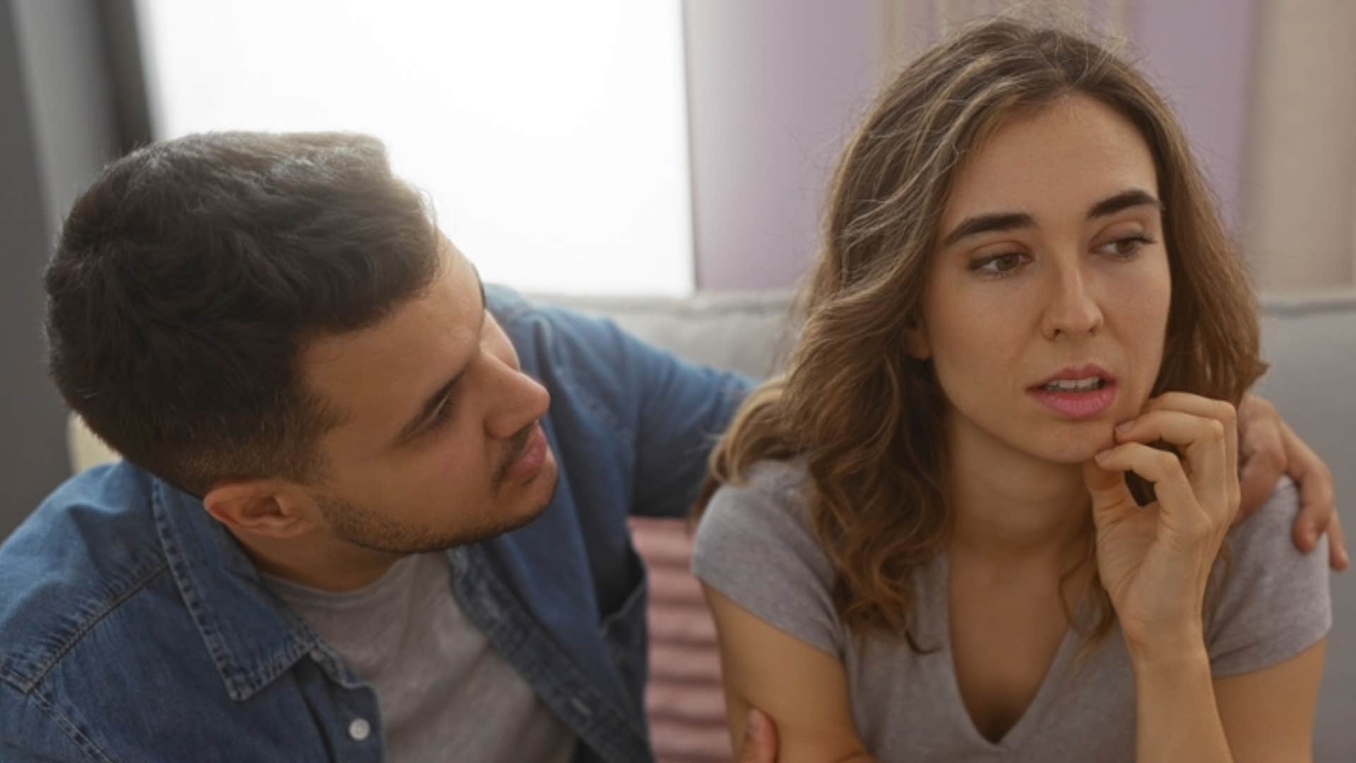man telling woman she deserves better trying to comfort her