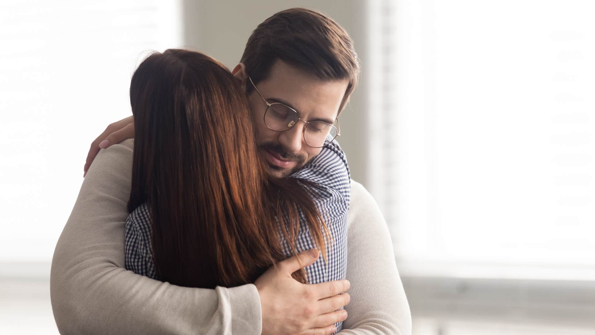 A narcissistic man embraces his wife telling her nobody would put up with her