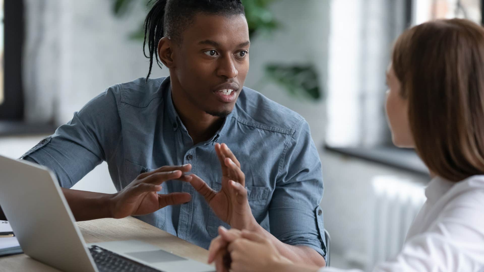 A man tells his co-worker to unpack this issue that they have.