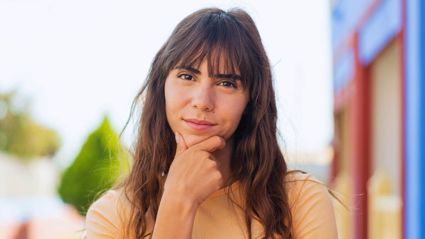 Phrases People Say When They Quietly Judge Everyone But Don't Say It Out Loud judgmental young woman thinking