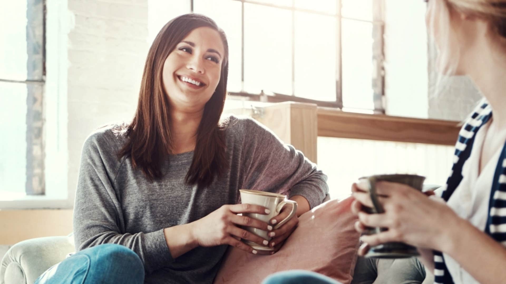 woman appearing not to judge friend in conversation
