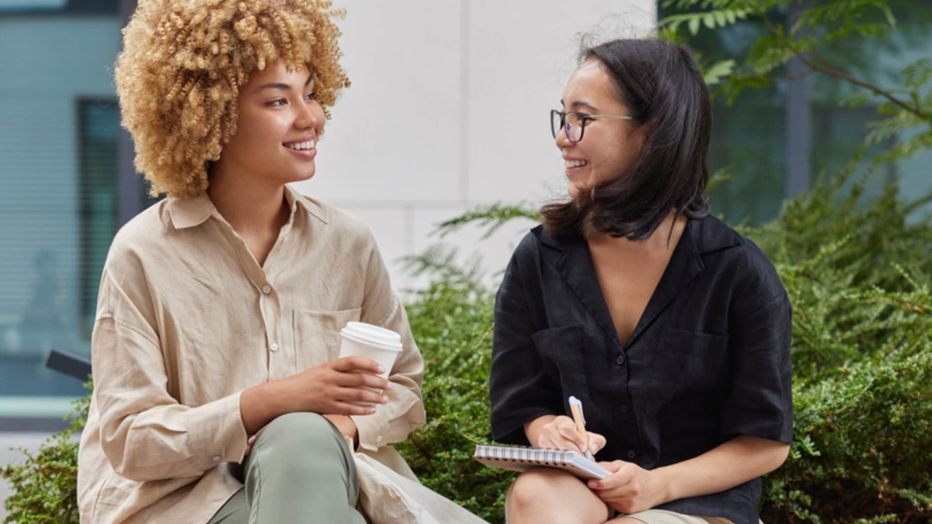 women having a conversation outside