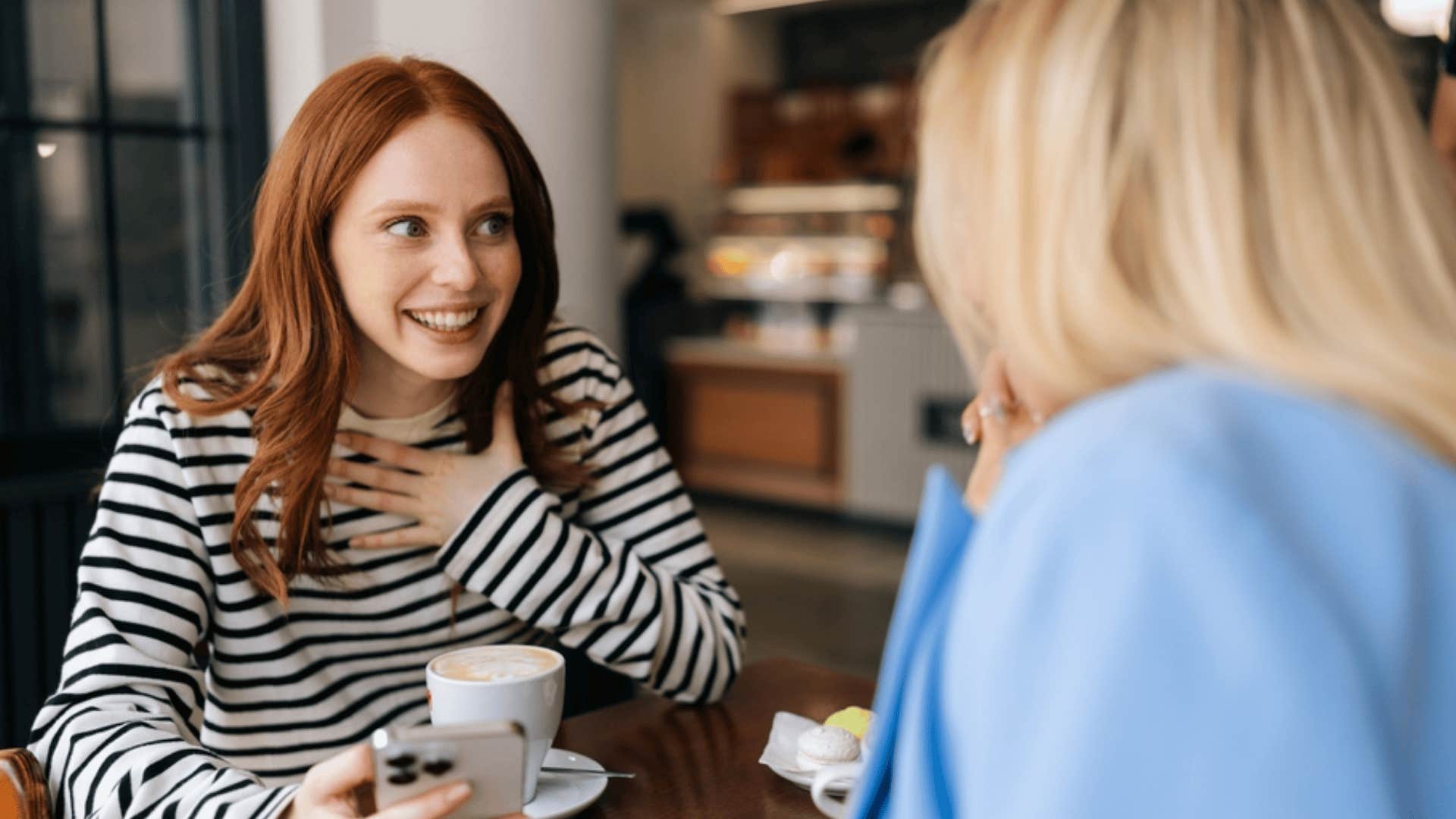 smiling woman saying shes happy for her friend 