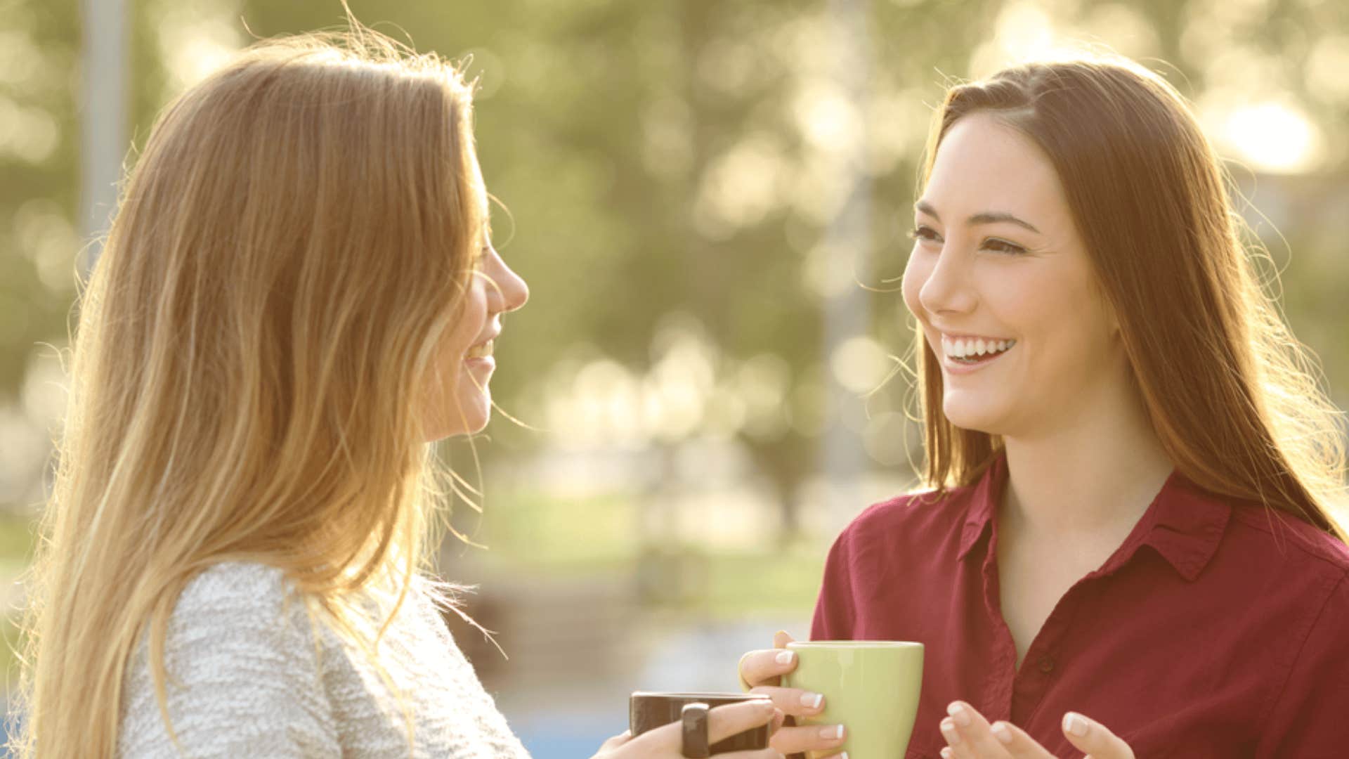 woman laughing with friend who says shes just kidding