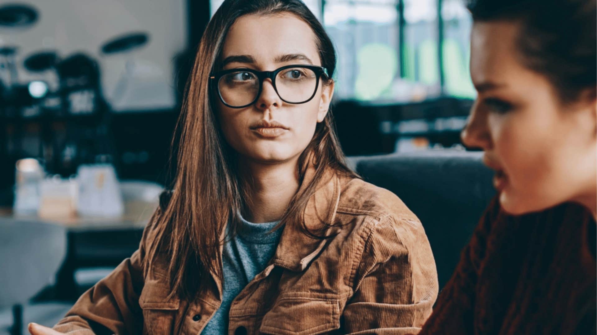 woman about to say no offense to friend
