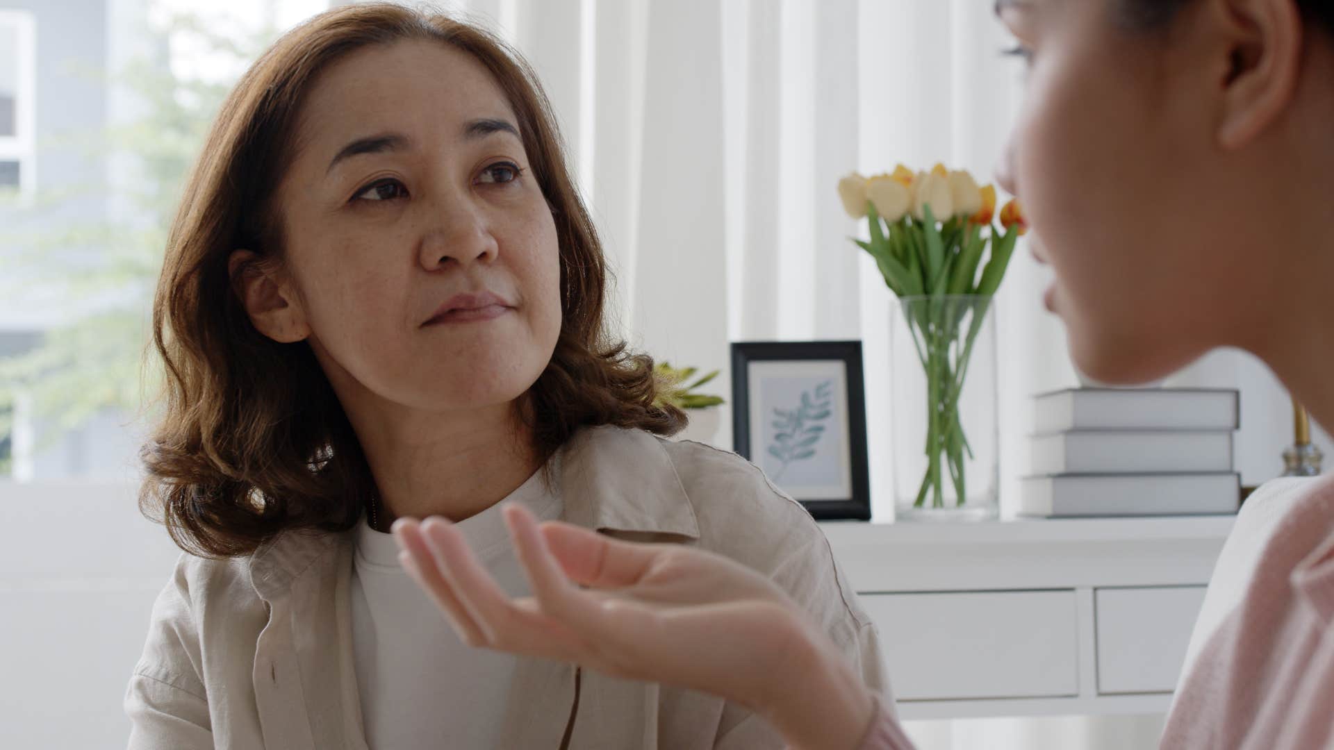 Woman thinking "it's just a joke" arguing with her adult daughter.