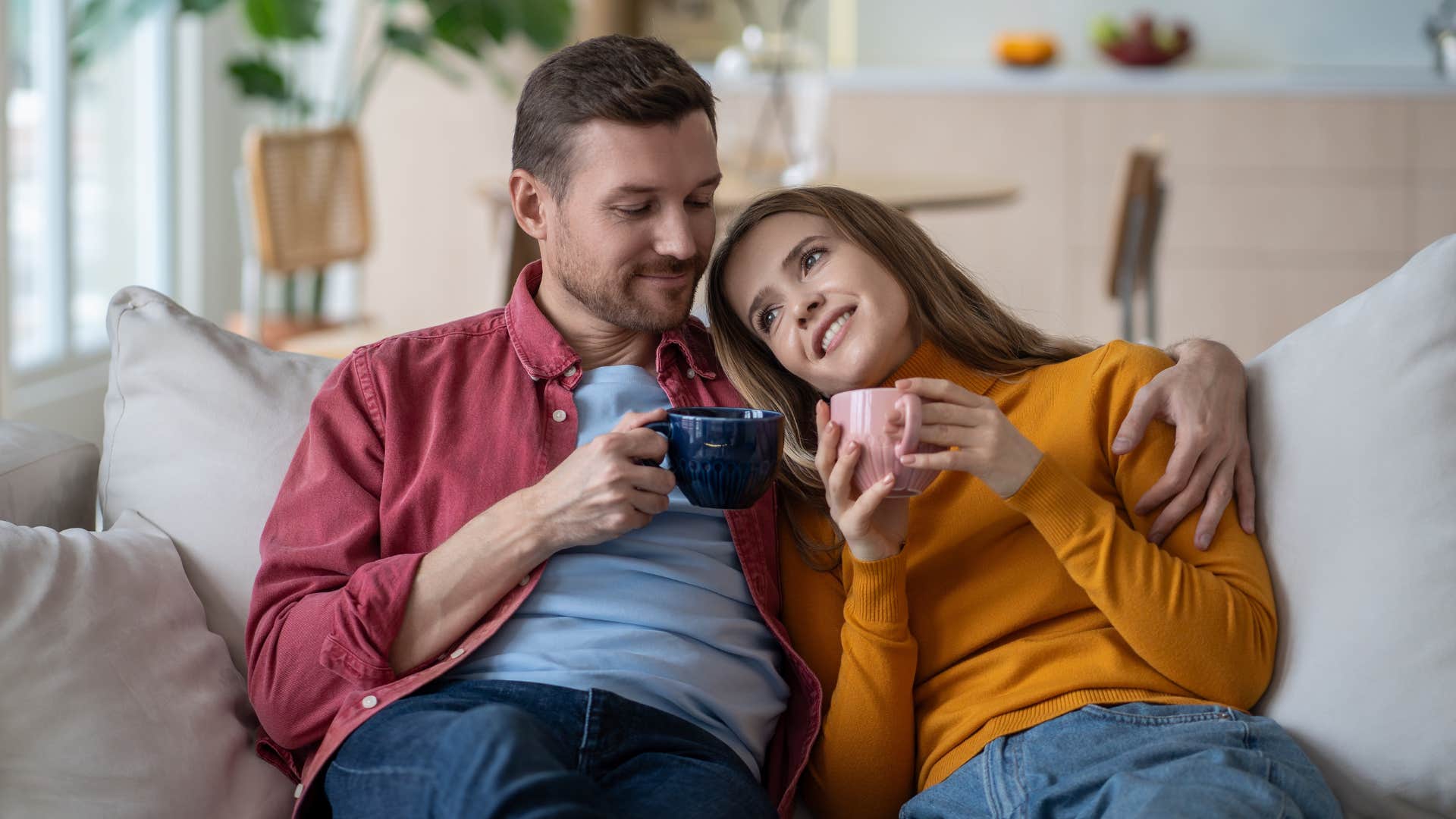 A wife tells her husband that she is proud of him.