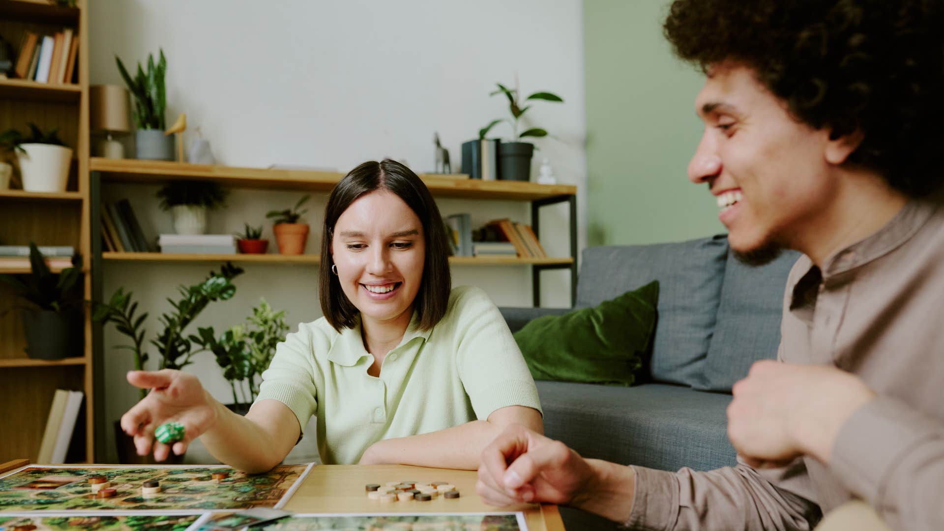 A man admits he was wrong and his wife was right as they put together puzzles.