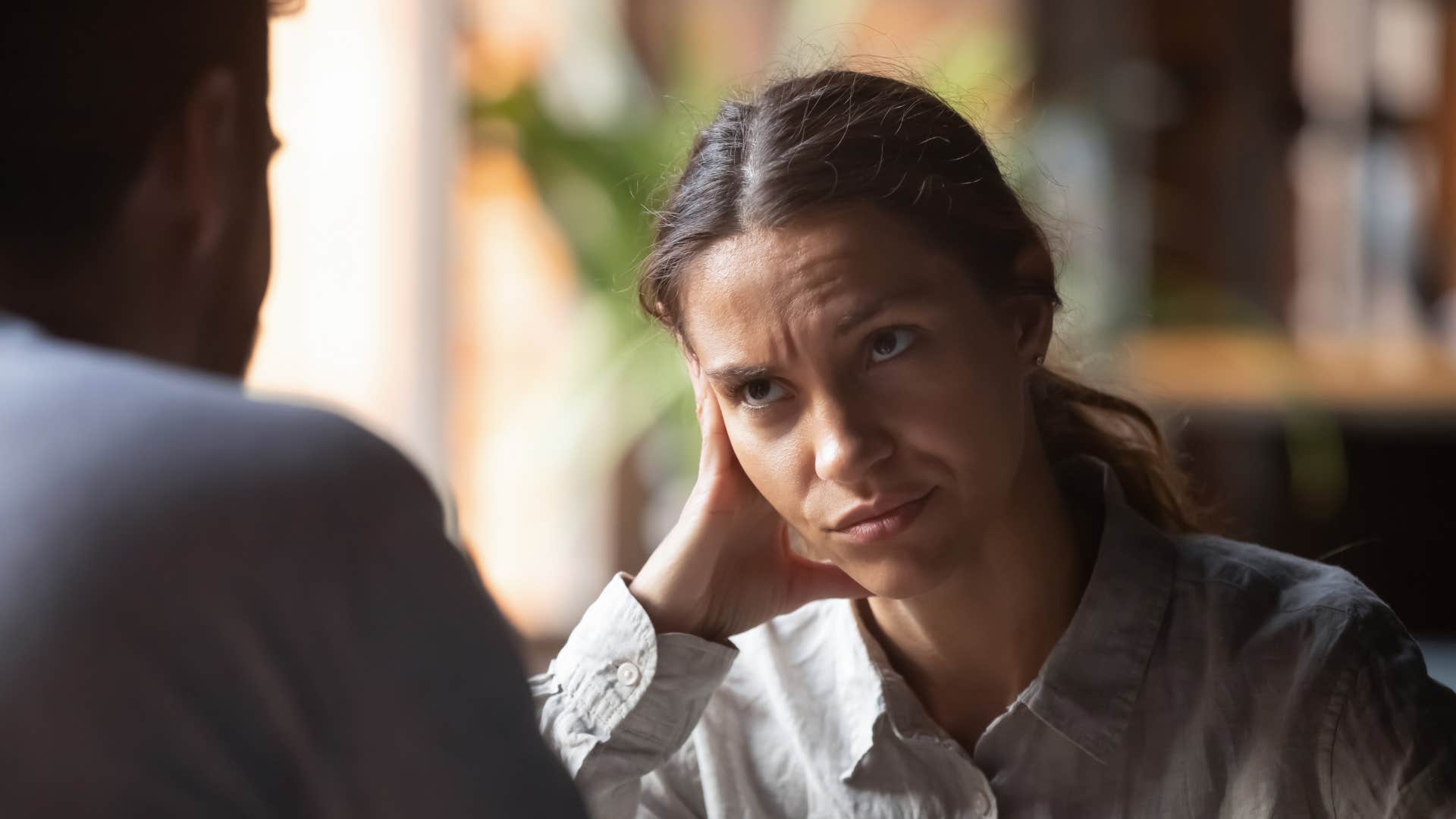 A man tells his wife that they will figure out an issue together.