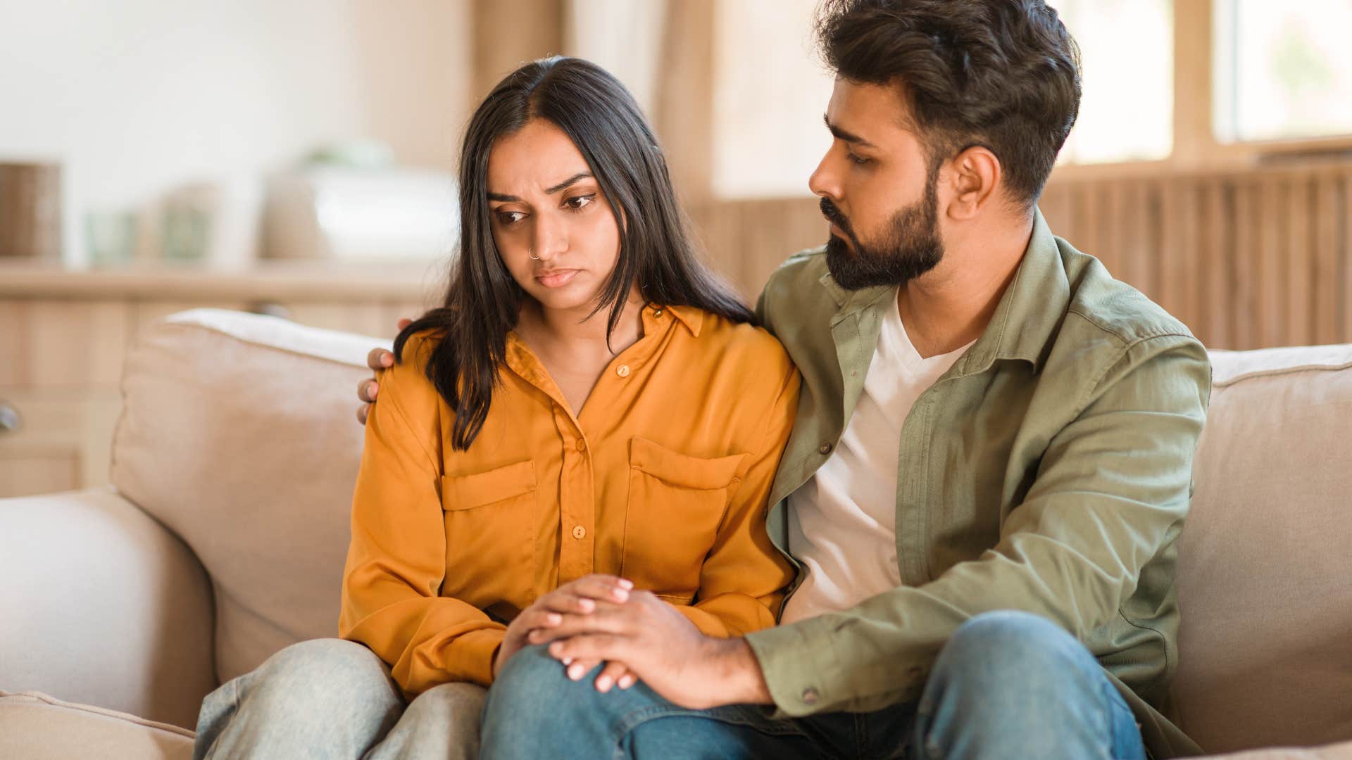 woman telling boyfriend she's changed