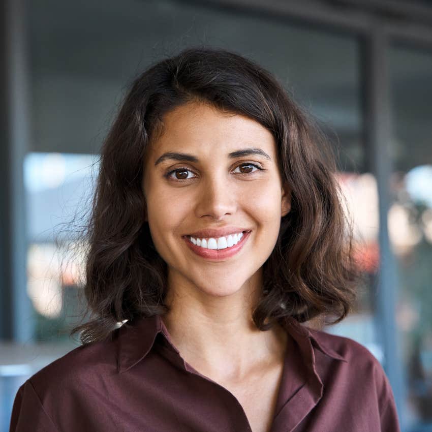 woman smiling who is unforgettable