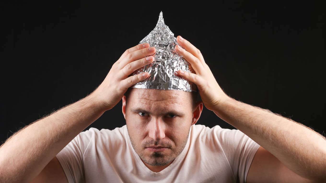 psychological traits conspiracy theory believers conspiracy theorist in tinfoil hat