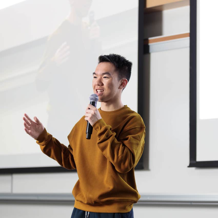 man who is public speaking to audiences pain points