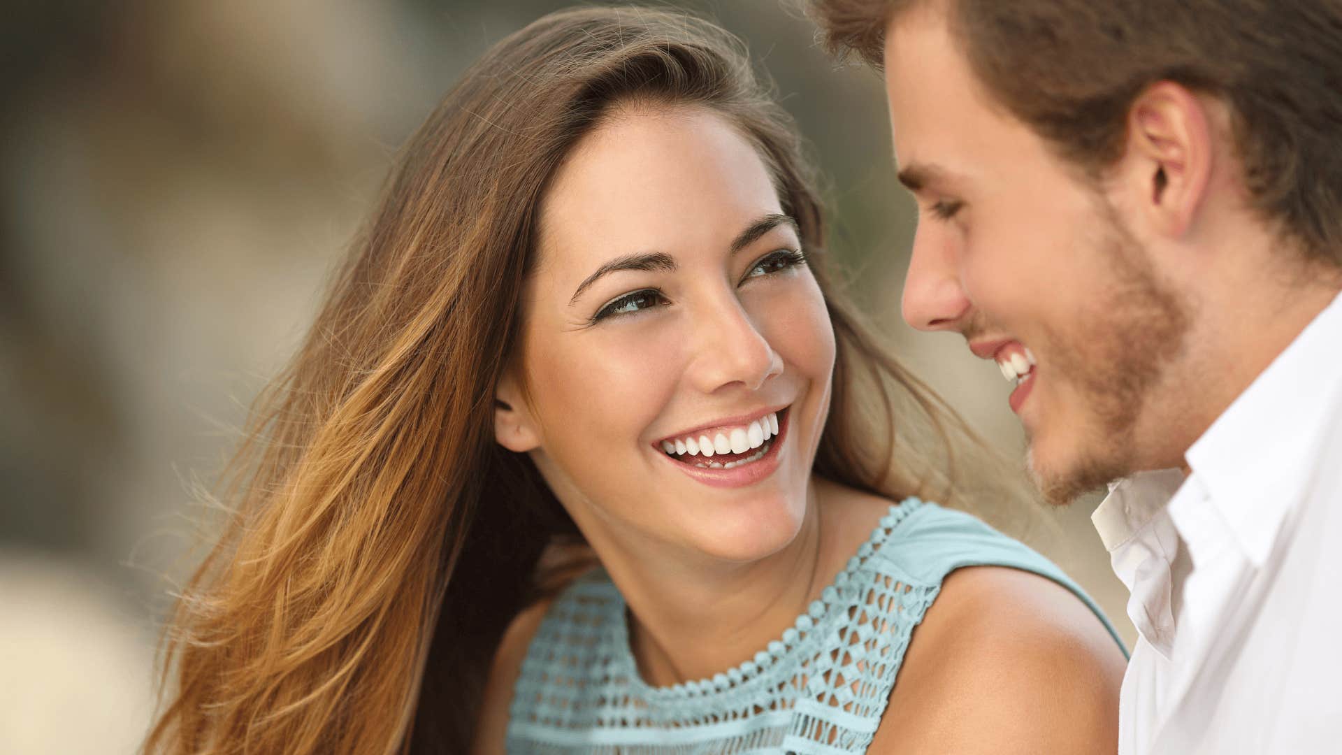 smiling woman with man who is a darn good husband