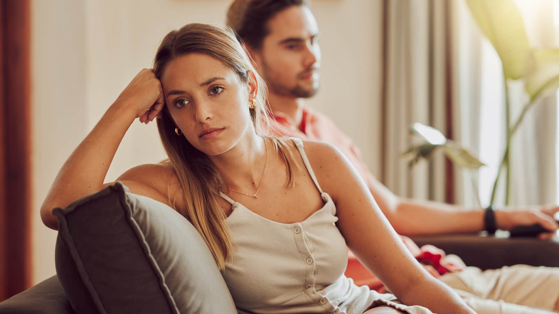 quiet woman next to man who stopped trying