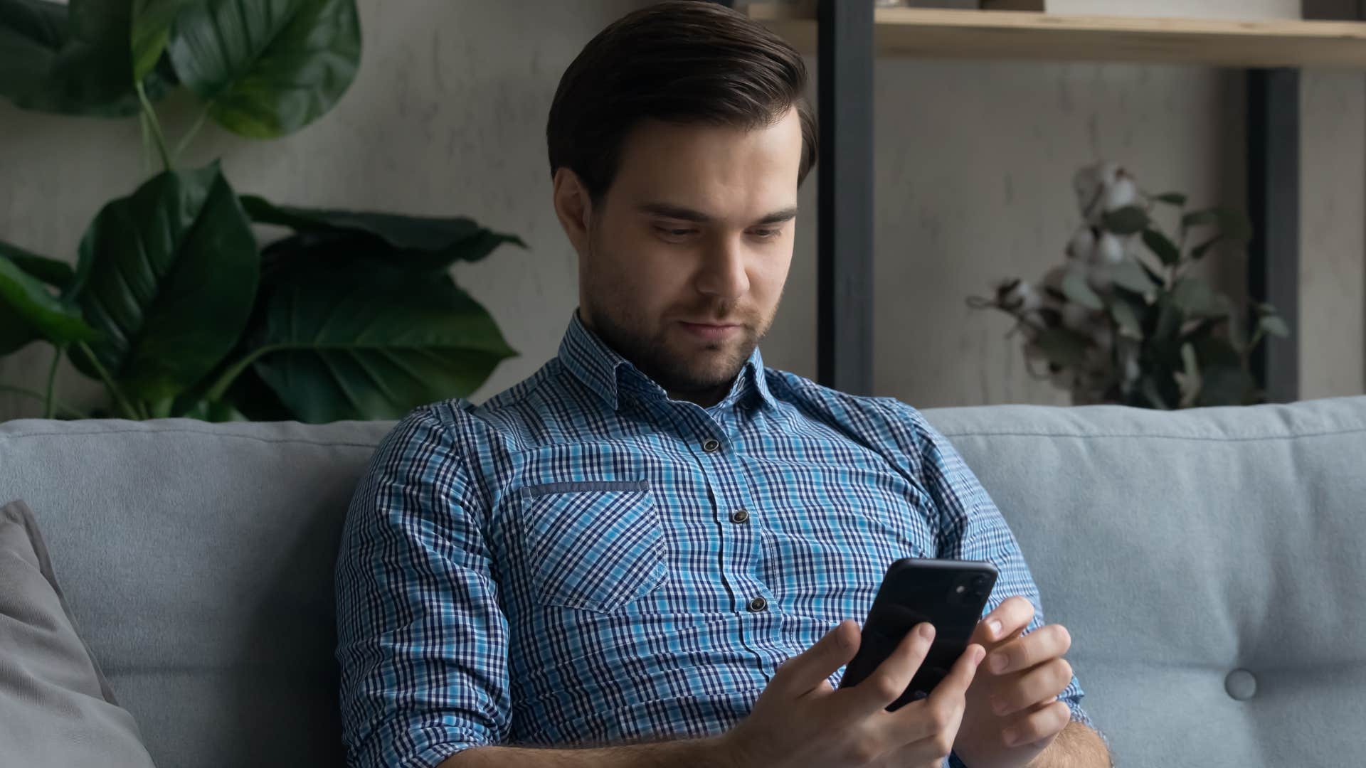 man archiving memories on his phone