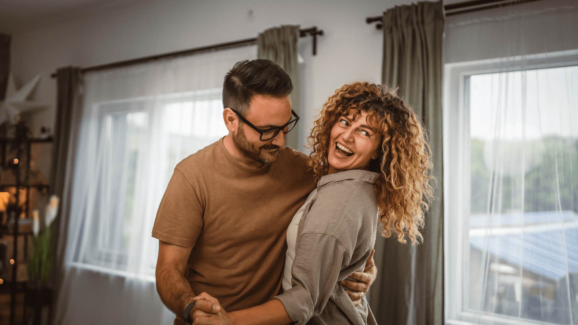 confident man who is memorable dancing with woman